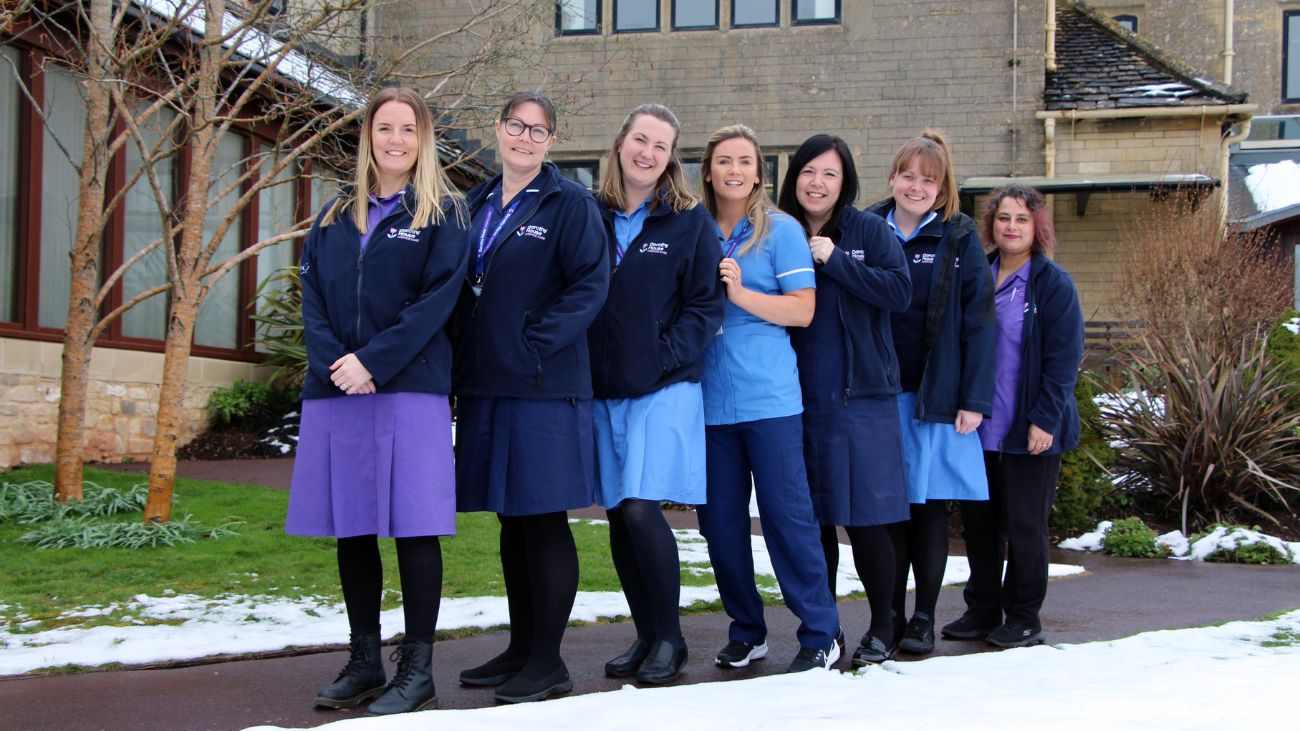 Community Palliative Care Team in gardens at Winsley