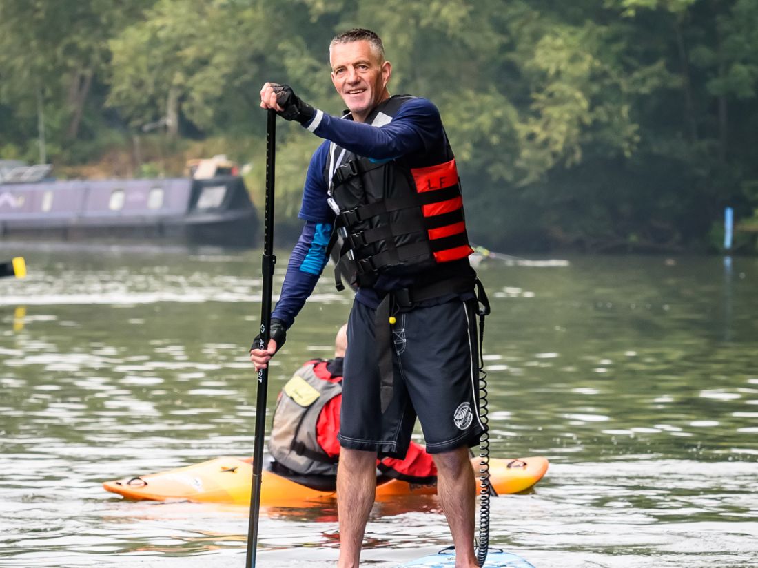 Leigh on a paddle board - paddling for end of life care 